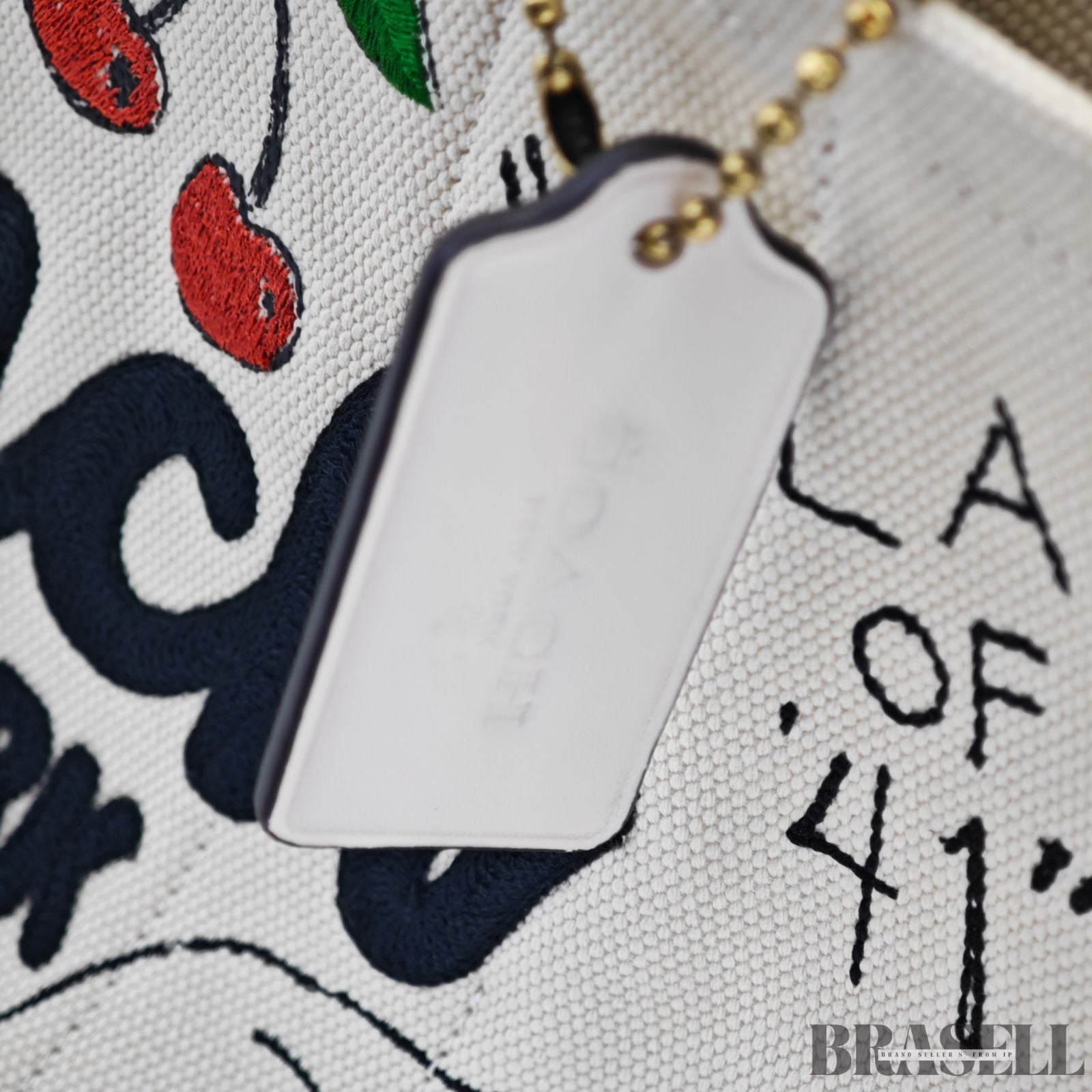 COACH コーチ カーゴトートバッグ スケッチプリント バッグ 2way ショルダーバッグ ハンドバッグ 刺繍 ファンシー 可愛い ホワイト レディース 保存袋 ショルダーストラップ